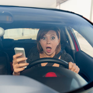 Using Cell Phones While Driving Increases Probability Of Accidents